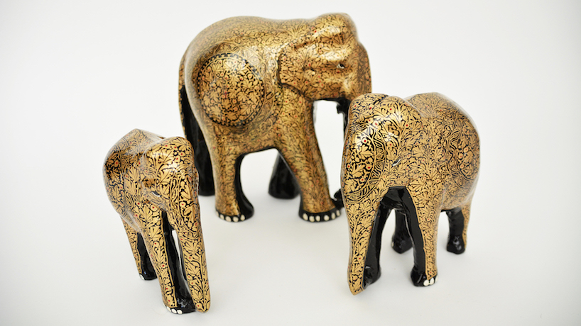 muughl m&acirc;ch&eacute;'s wood and papier-m&acirc;ch&eacute; elephants are handcrafted by indian artisans
