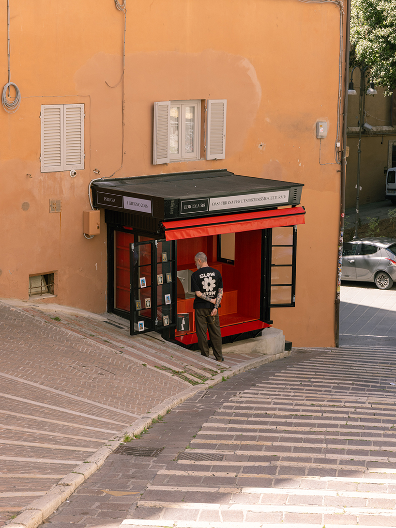 historic perugia newsstand reconfigures into stepped red oak mini reading kiosk - 4