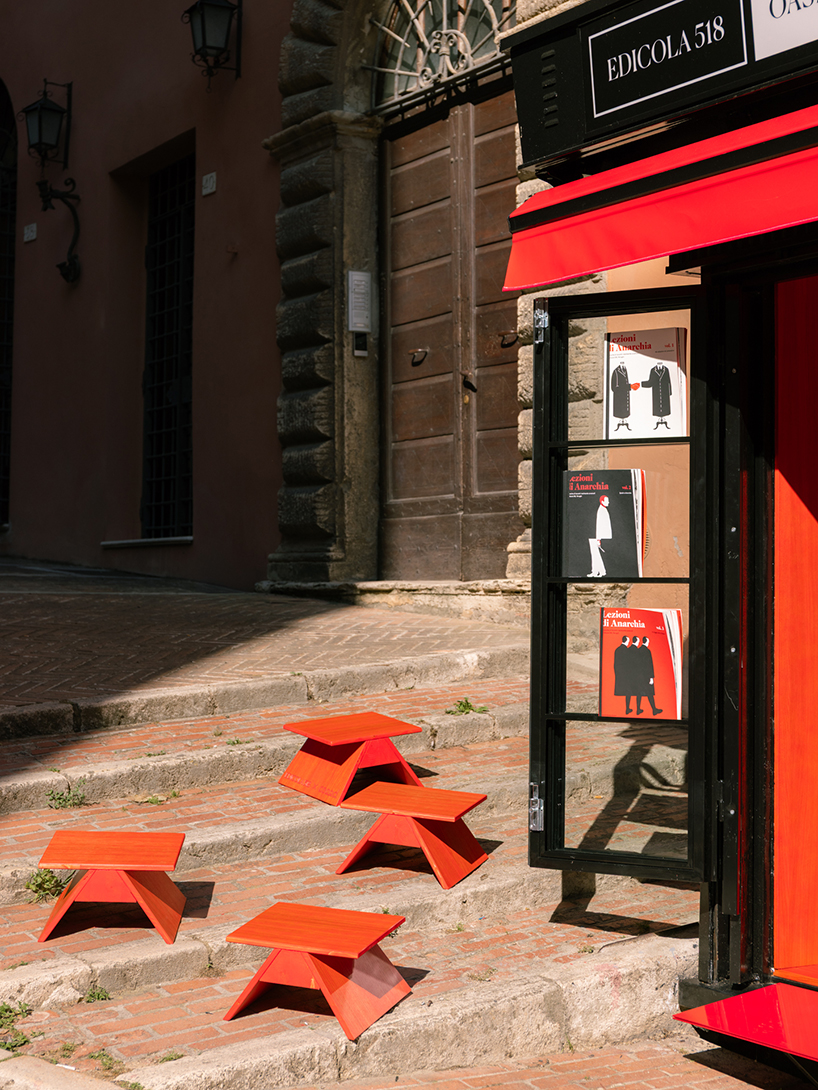 historic perugia newsstand reconfigures into stepped red oak mini reading kiosk - 9