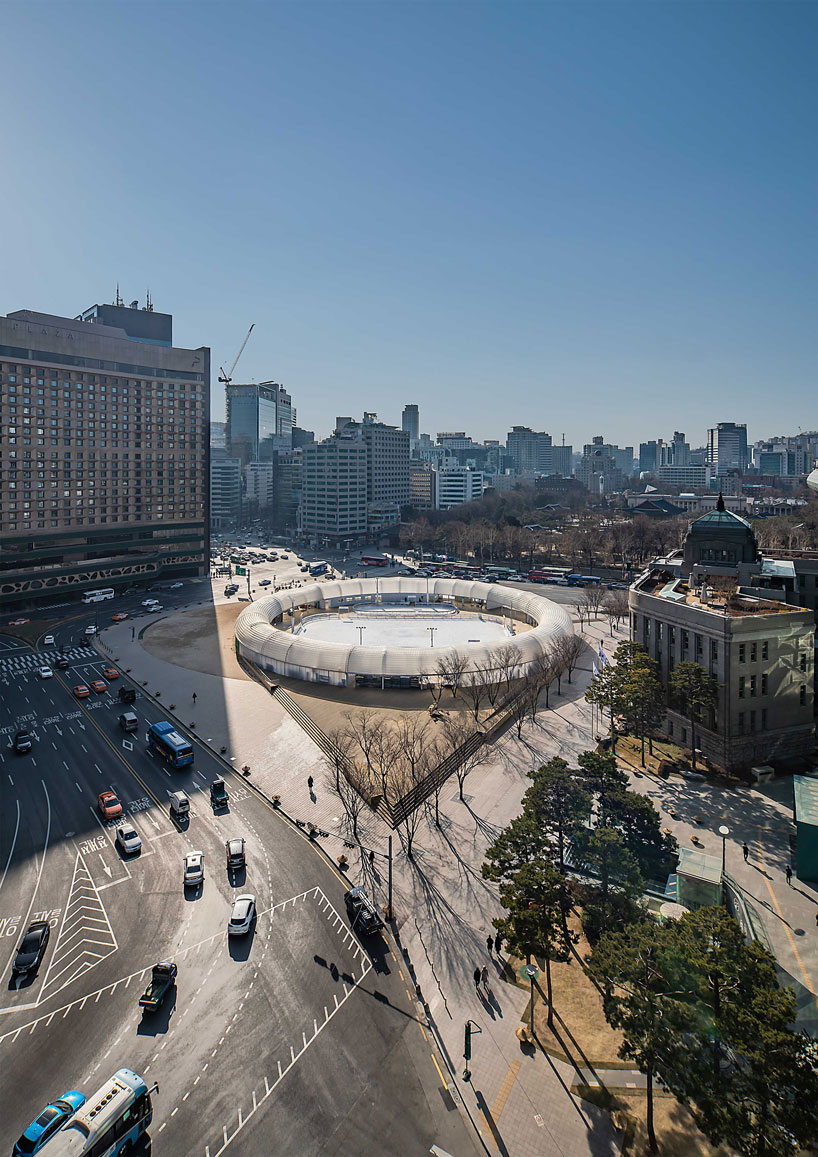 CoRe + graft object form a giant pneumatic ring for seoul square ice rink designboom