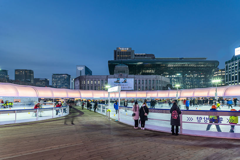 CoRe + graft object form a giant pneumatic ring for seoul square ice rink designboom