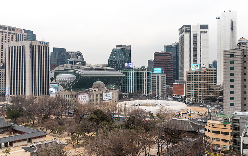 CoRe + graft object form a giant pneumatic ring for seoul square ice rink designboom