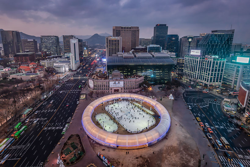 CoRe + graft object form a giant pneumatic ring for seoul square ice rink designboom