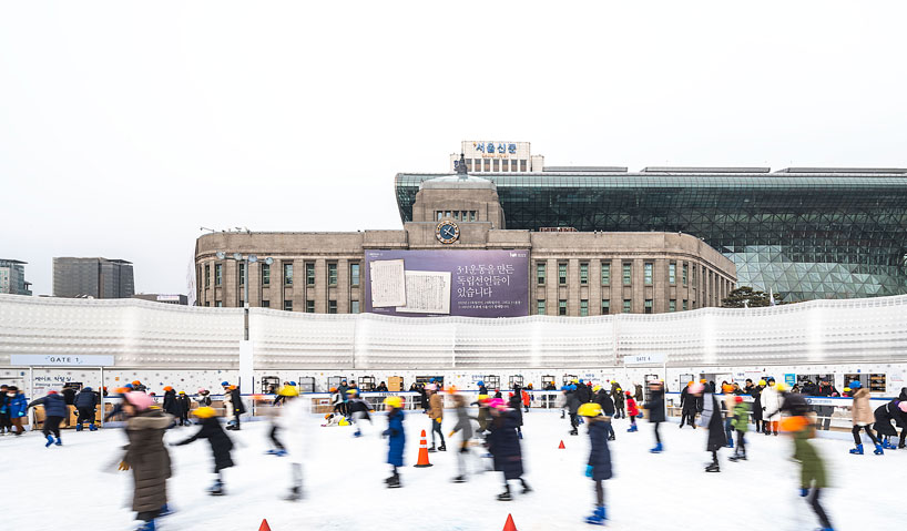 CoRe + graft object form a giant pneumatic ring for seoul square ice rink designboom