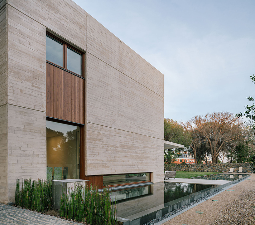 DL+A designs a fortress-like family house in madrid oriented towards a sunny garden