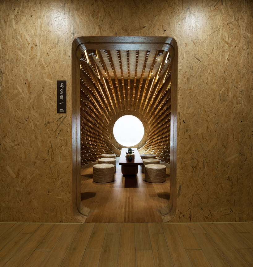 999 wooden sticks convert a rectangular room into an elliptical teahouse by  minax