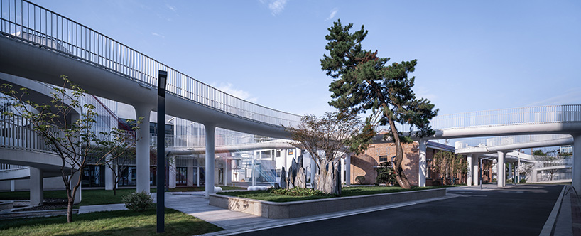 floating cloud corridor hovers above minax's factory renovation in china 