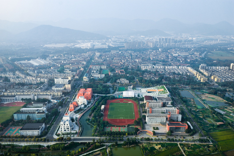 red and white geometric sports complex emerges along daixi&rsquo;s riverfront - 1