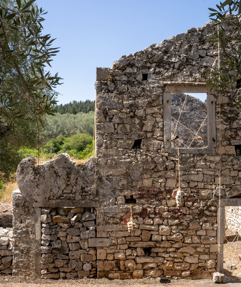 talmon biran's installation explores states of balance amid architectural ruins in greece