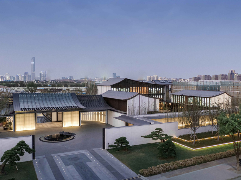 lacime architects reflects the suzhou leisure center in pools of water in china