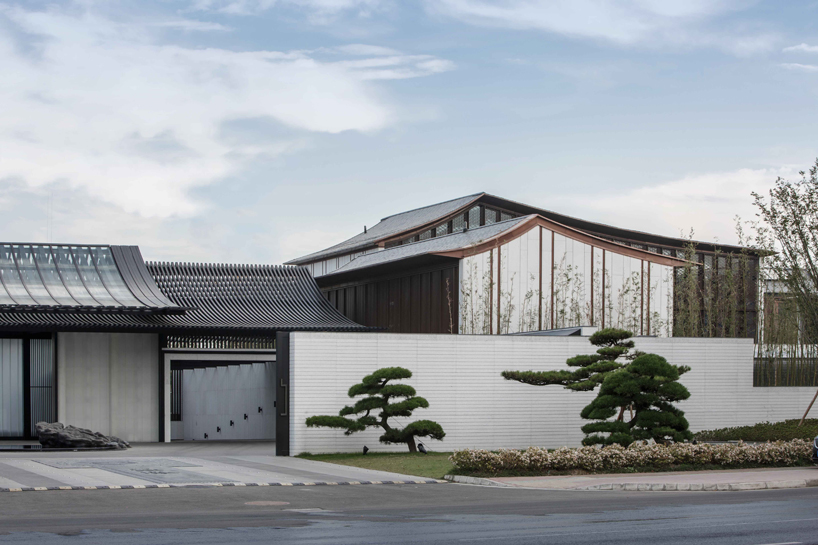 lacime architects reflects the suzhou leisure center in pools of water in china