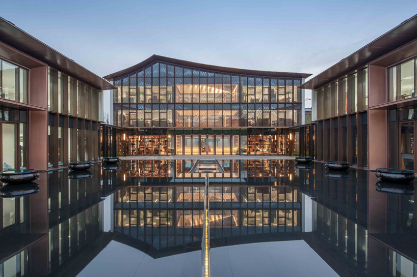 lacime architects reflects the suzhou leisure center in pools of water in china