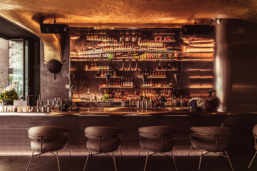 Copper Finishes Adorn Inns Whiskey Bar By Wooton Designers