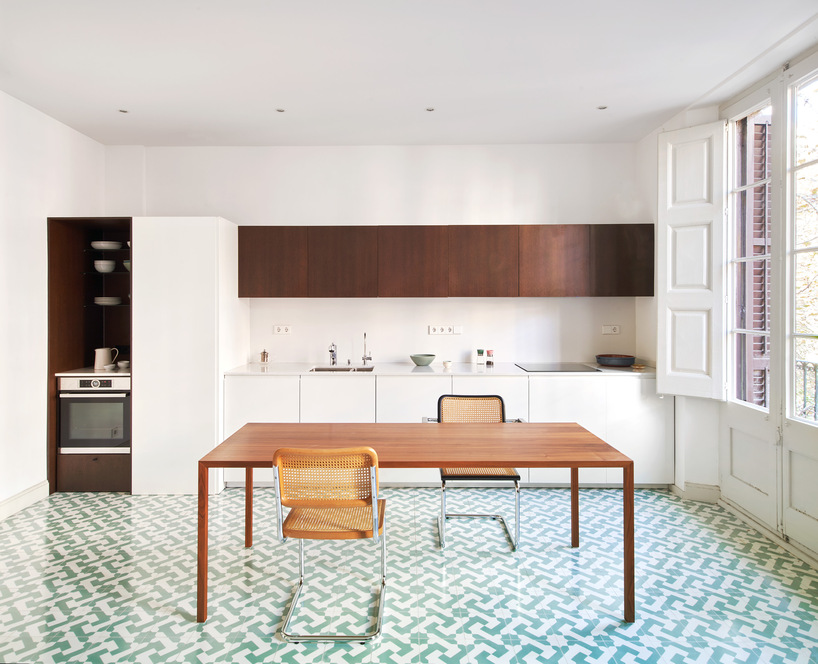 handmade hydraylic tile flooring becomes the protagonist of renovation by forma in barcelona