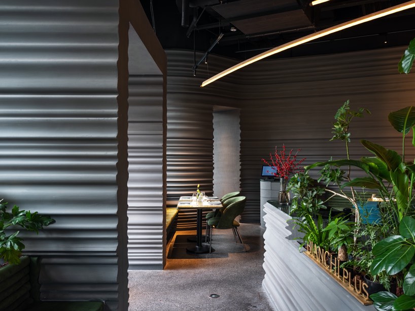 undulating walls emerge within WAY studio's restaurant in shanghai