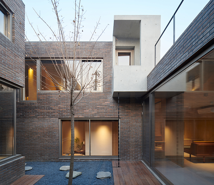 MINOR lab completes three-part brick residence for multi-generation ...