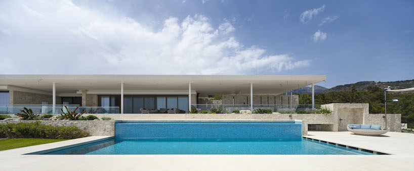 gerner gerner plus designs stone villa in crete with panoramic view to the libyan sea