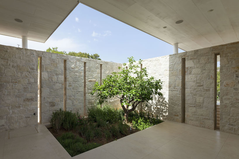 gerner gerner plus designs stone villa in crete with panoramic view to the libyan sea