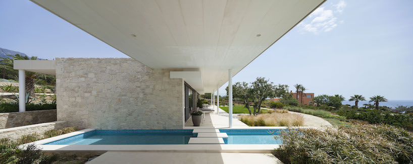 gerner gerner plus designs stone villa in crete with panoramic view to the libyan sea