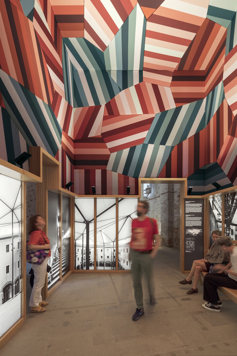sauerbruch hutton's venice biennale installation combines solid timber with a translucent pattern