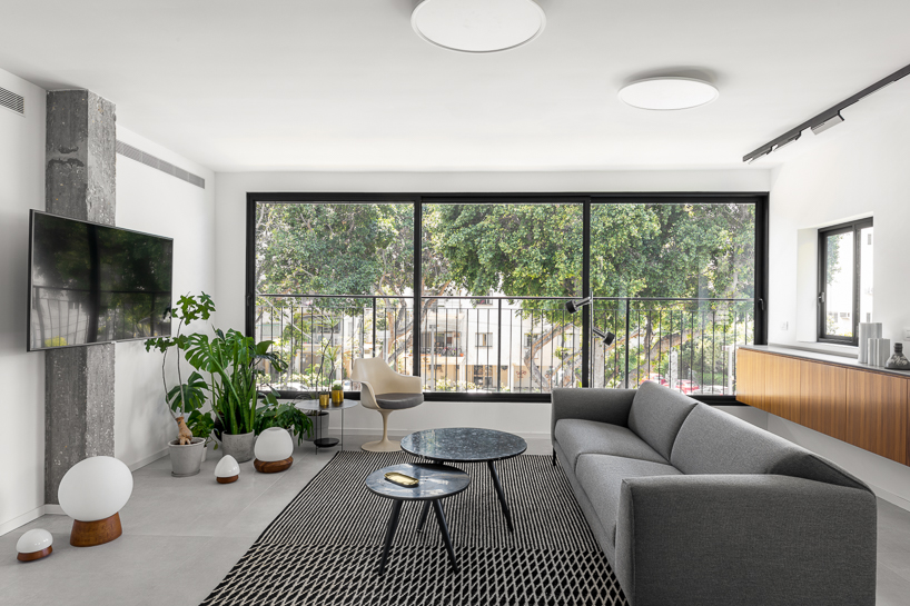 studioDO forms the BZ apartment as an olive-green weekend retreat in tel-aviv designboom