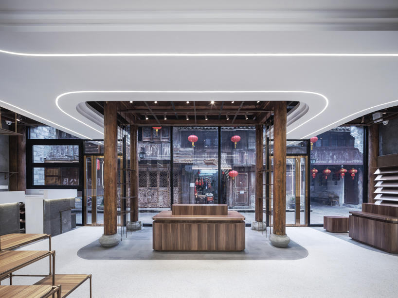 LYCS architecture's jiang nan zan store rises as a wave overlooking historic city of linhai