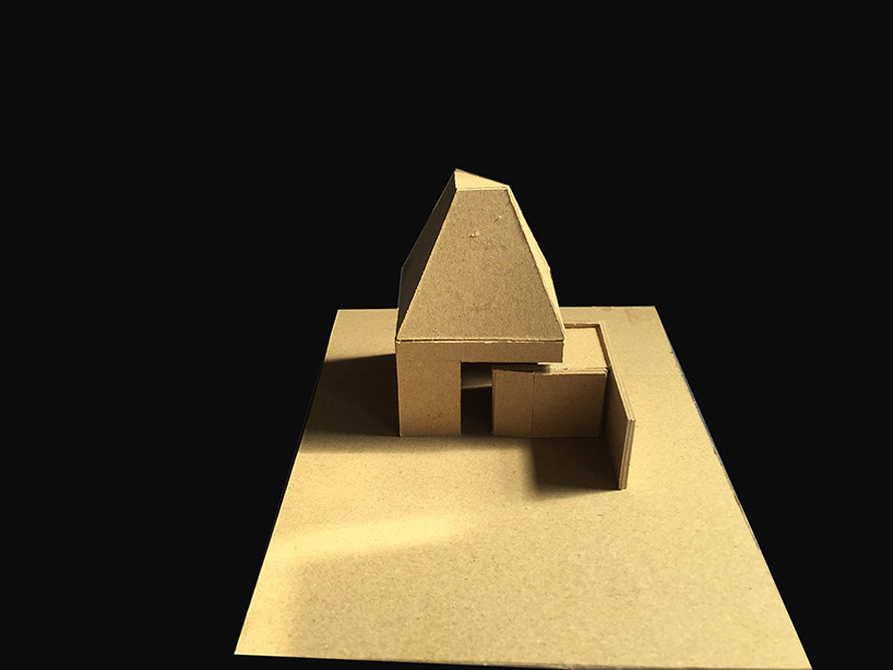 karan darda's orange hindu temple in india creates a contrast with green surroundings