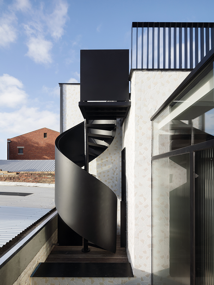 pandolfini architects transforms heritage building into apartments with minimal interventions