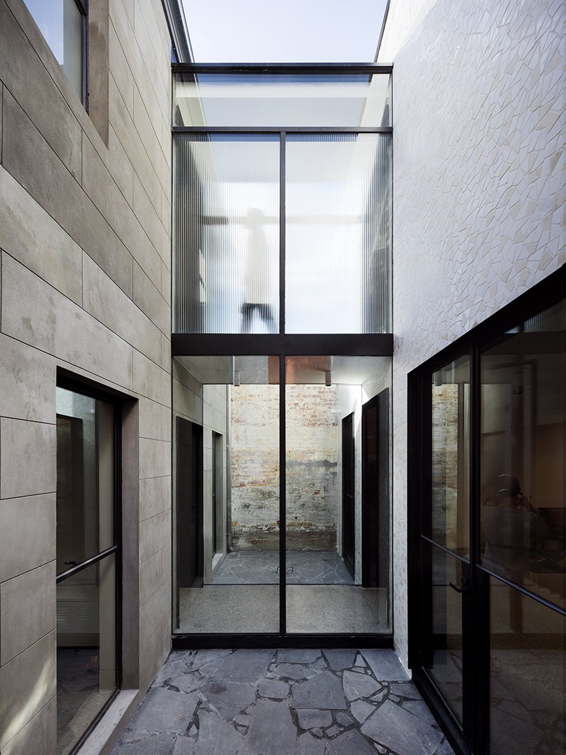 pandolfini architects transforms heritage building into apartments with minimal interventions