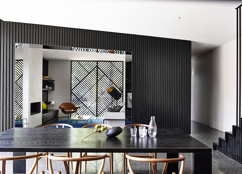 pandolfini architects adapts sculptural townhouse in australia to fit large family