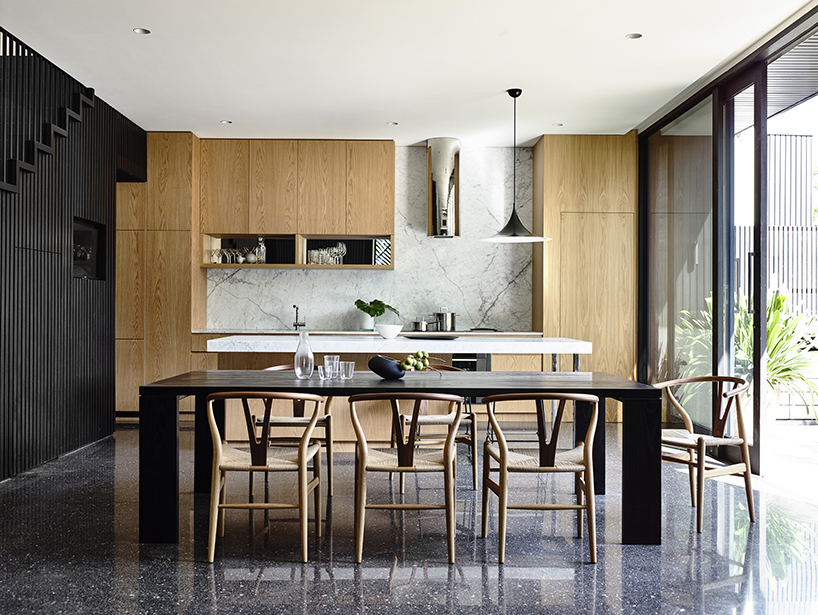 pandolfini architects adapts sculptural townhouse in australia to fit large family