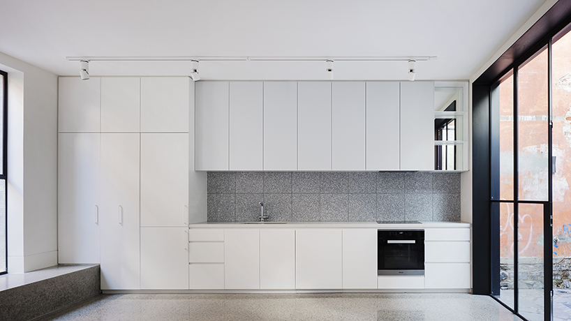 pandolfini architects transforms heritage building into apartments with minimal interventions