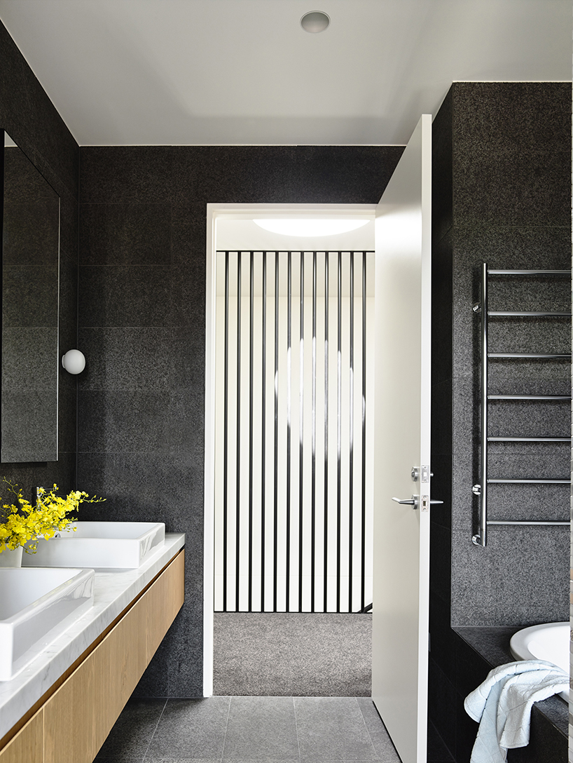 pandolfini architects adapts sculptural townhouse in australia to fit large family