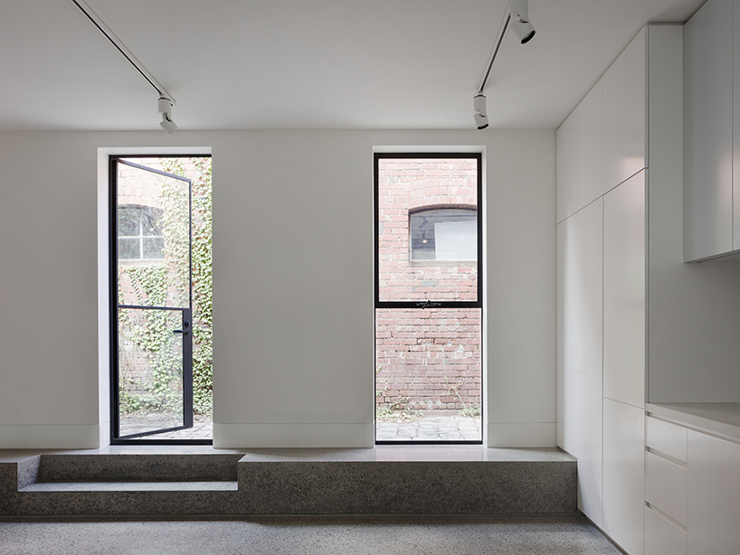 pandolfini architects transforms heritage building into apartments with minimal interventions