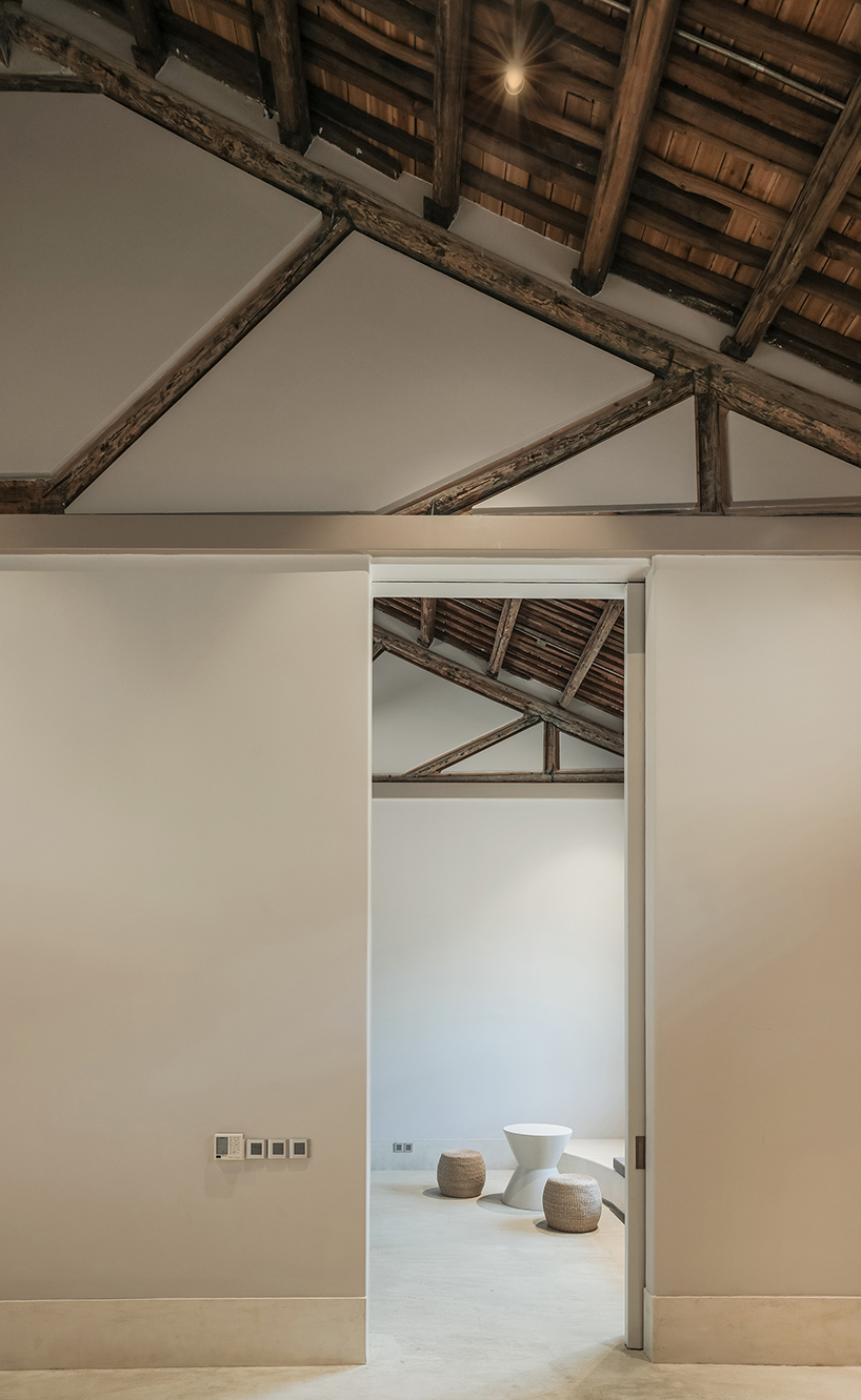 ares harmonizes architecture and nature in its chinese granary station transformed hotel