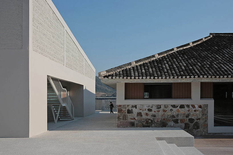 ares harmonizes architecture and nature in its chinese granary station transformed hotel