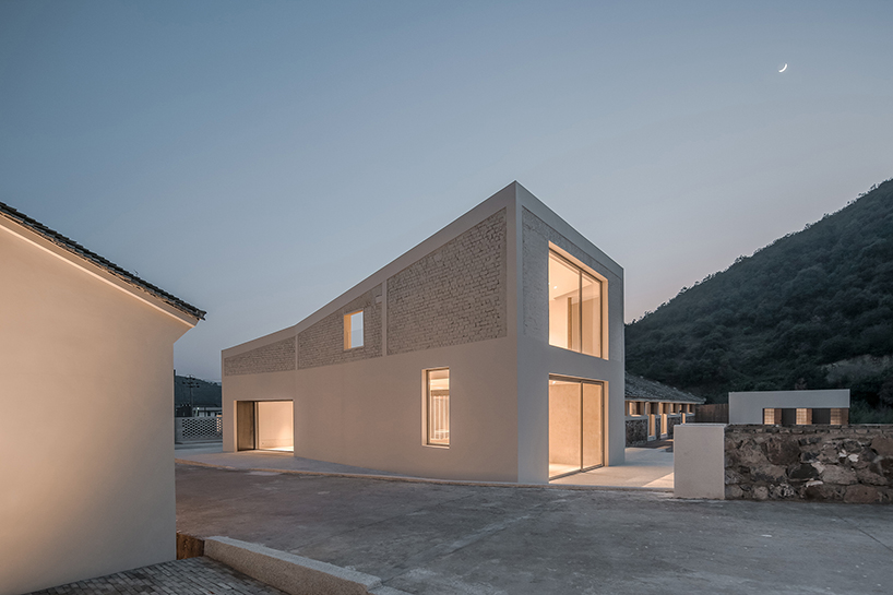 ares harmonizes architecture and nature in its chinese granary station transformed hotel