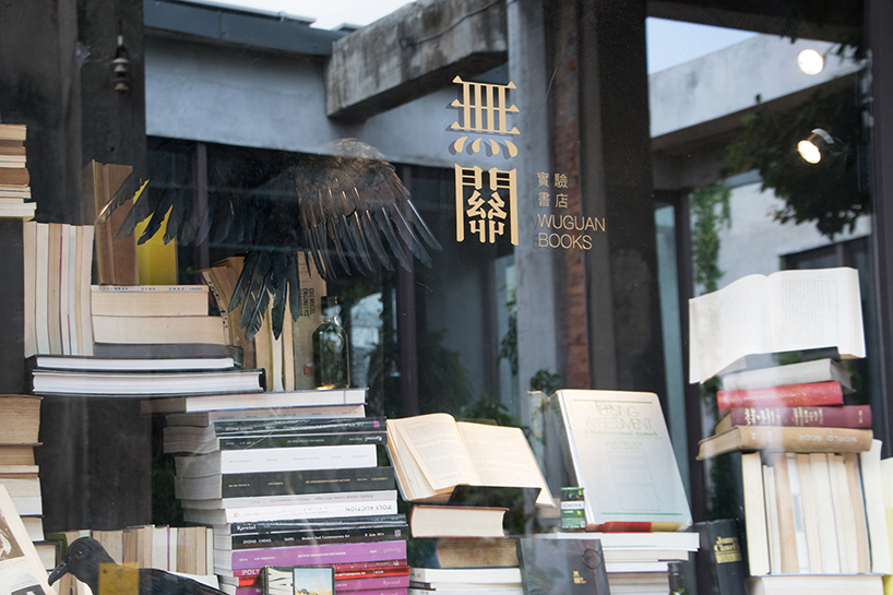 a dark library where every single book has its own light, by chu chih-kang
