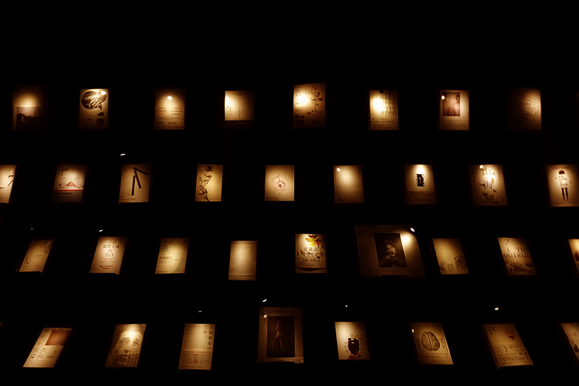 a dark library where every single book has its own light, by chu chih-kang