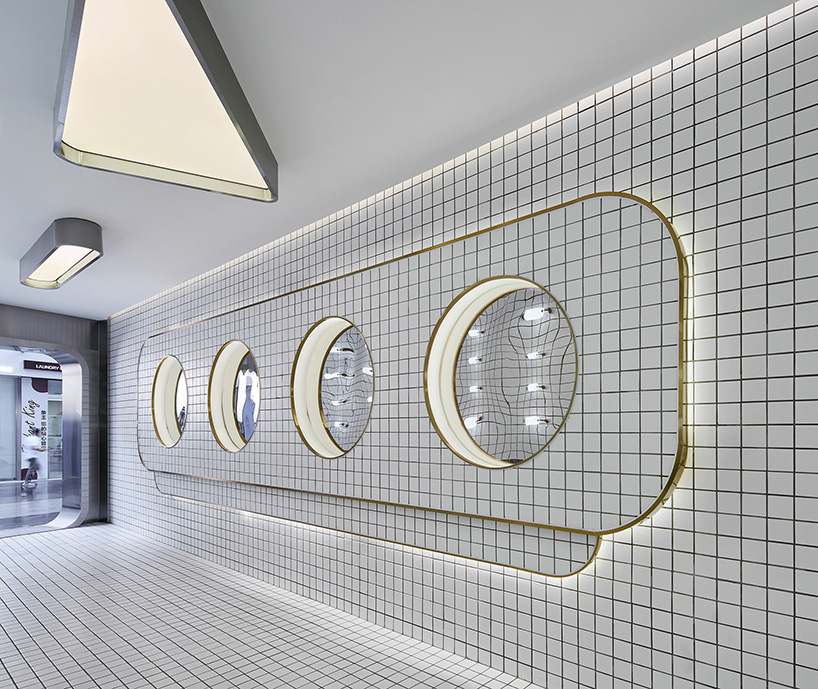 PIG design's public washroom interior in china reminds of space exploration scenes