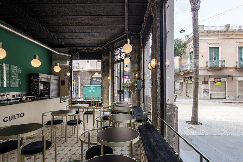 green walls and yellow zinc details decorate taller capitan's coffee shop in uruguay designboom