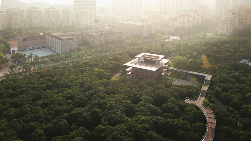 MLA+'s library in shenzhen park features an elevated walkway through the three crowns