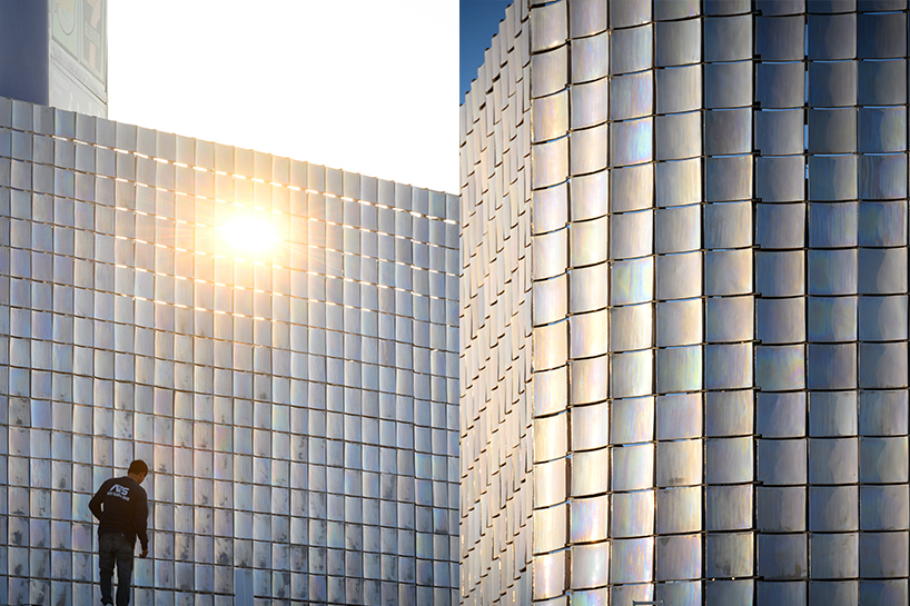 sher maker applies pearlescent tiles to gas station renovation in thailand