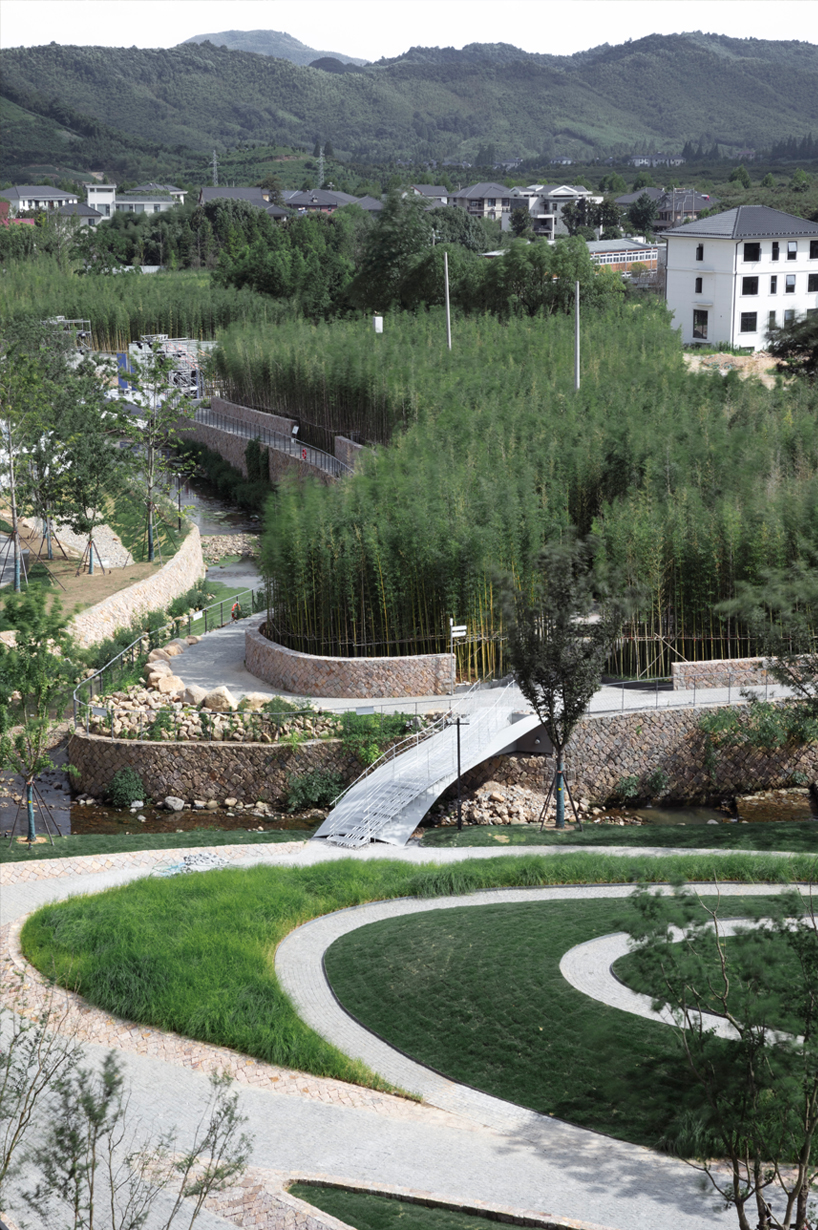 paper folding informs folio bridge's steel span over water path in china