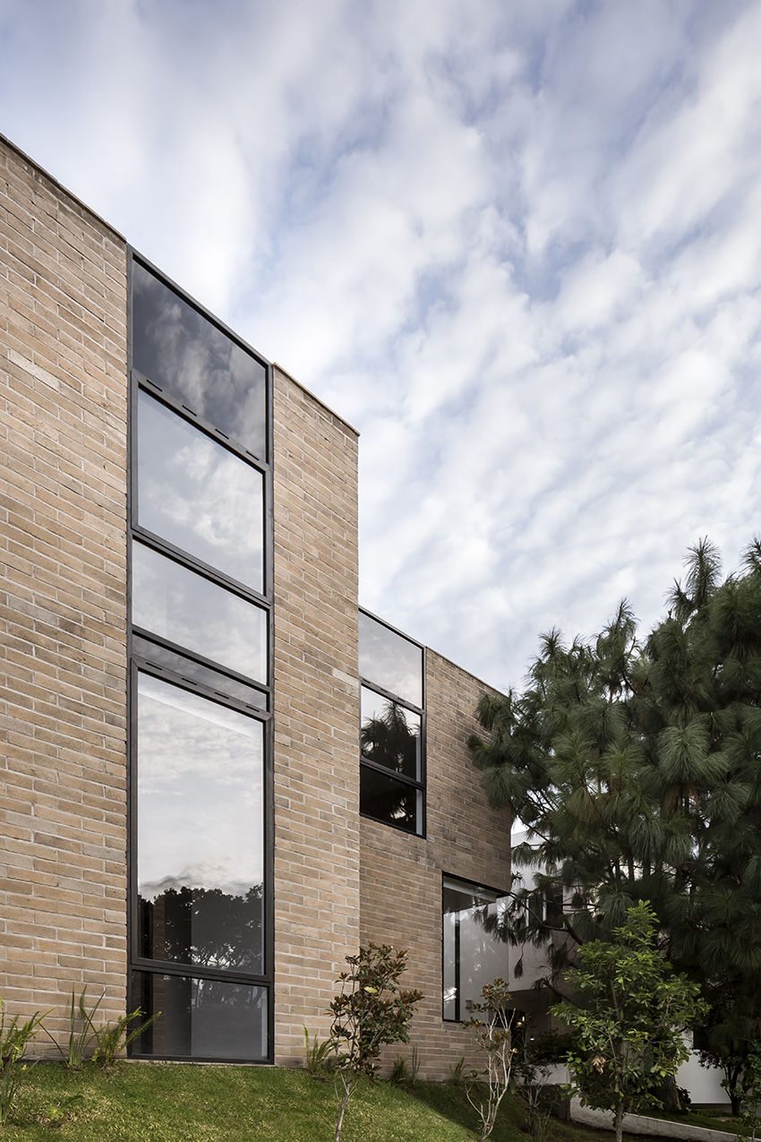 andres burguete creates 'house el cielo' from three brick volumes in mexico