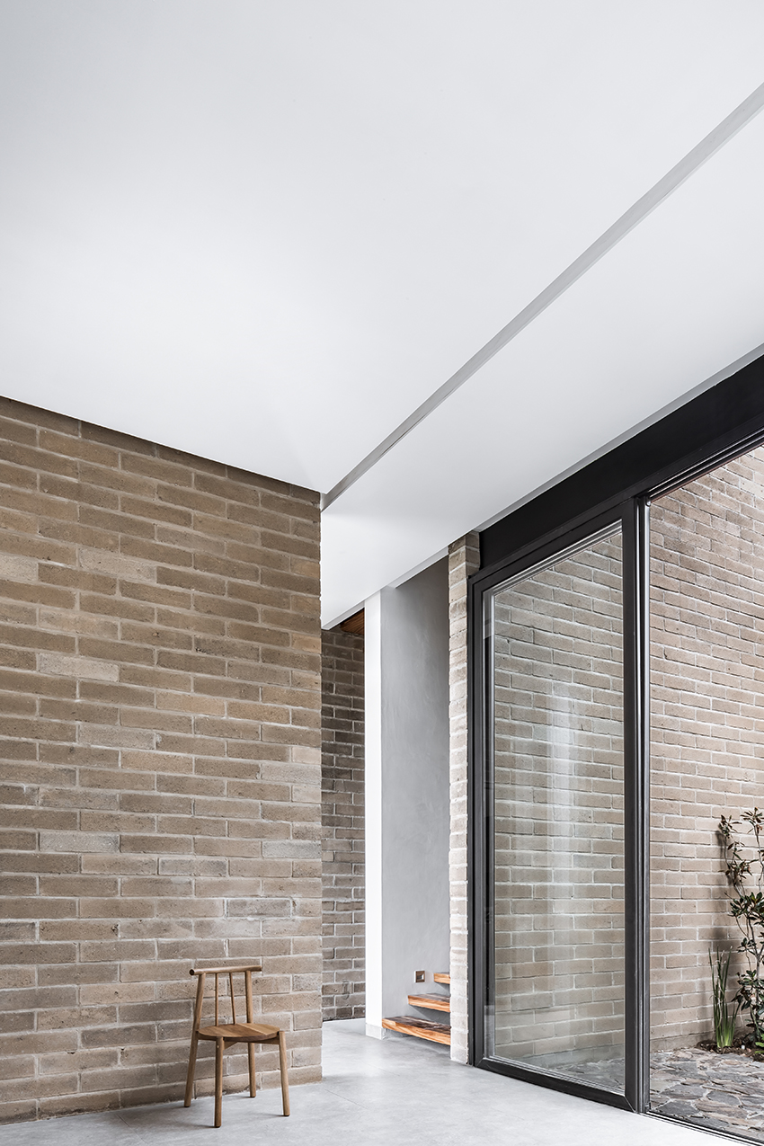 andres burguete creates 'house el cielo' from three brick volumes in mexico