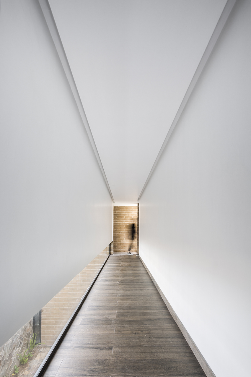 andres burguete creates 'house el cielo' from three brick volumes in mexico