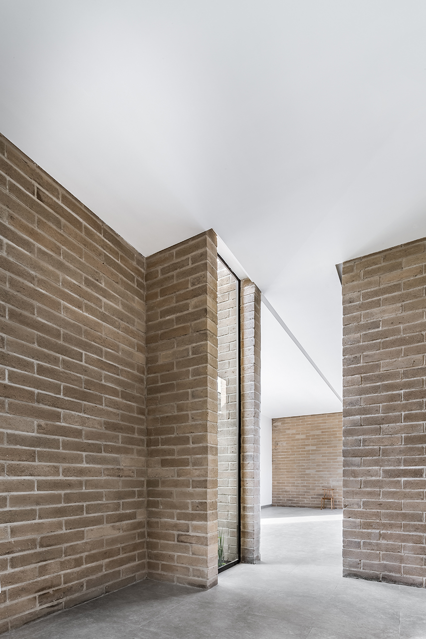 andres burguete creates 'house el cielo' from three brick volumes in mexico