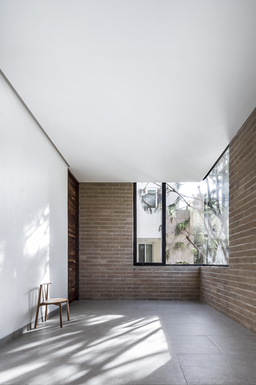 andres burguete creates 'house el cielo' from three brick volumes in mexico