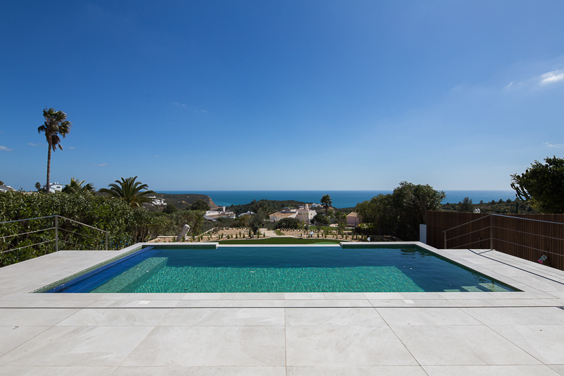portuguese coast villa by CORE architects overlooks the ocean